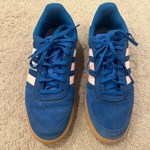 Adidas Royal Blue Sneakers with light pink stripes. Lightly worn. Size 8.5 women